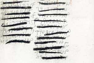 drawn numbers covered with dark, bold strokes