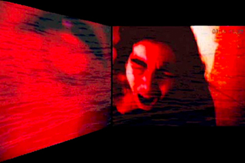red and black image of screaming woman