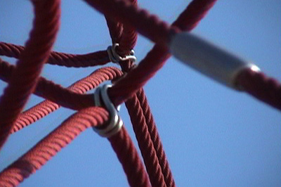 detail of red rope structure on blue background