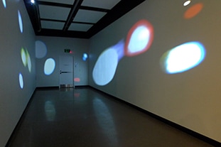 dark room with projected spot lights